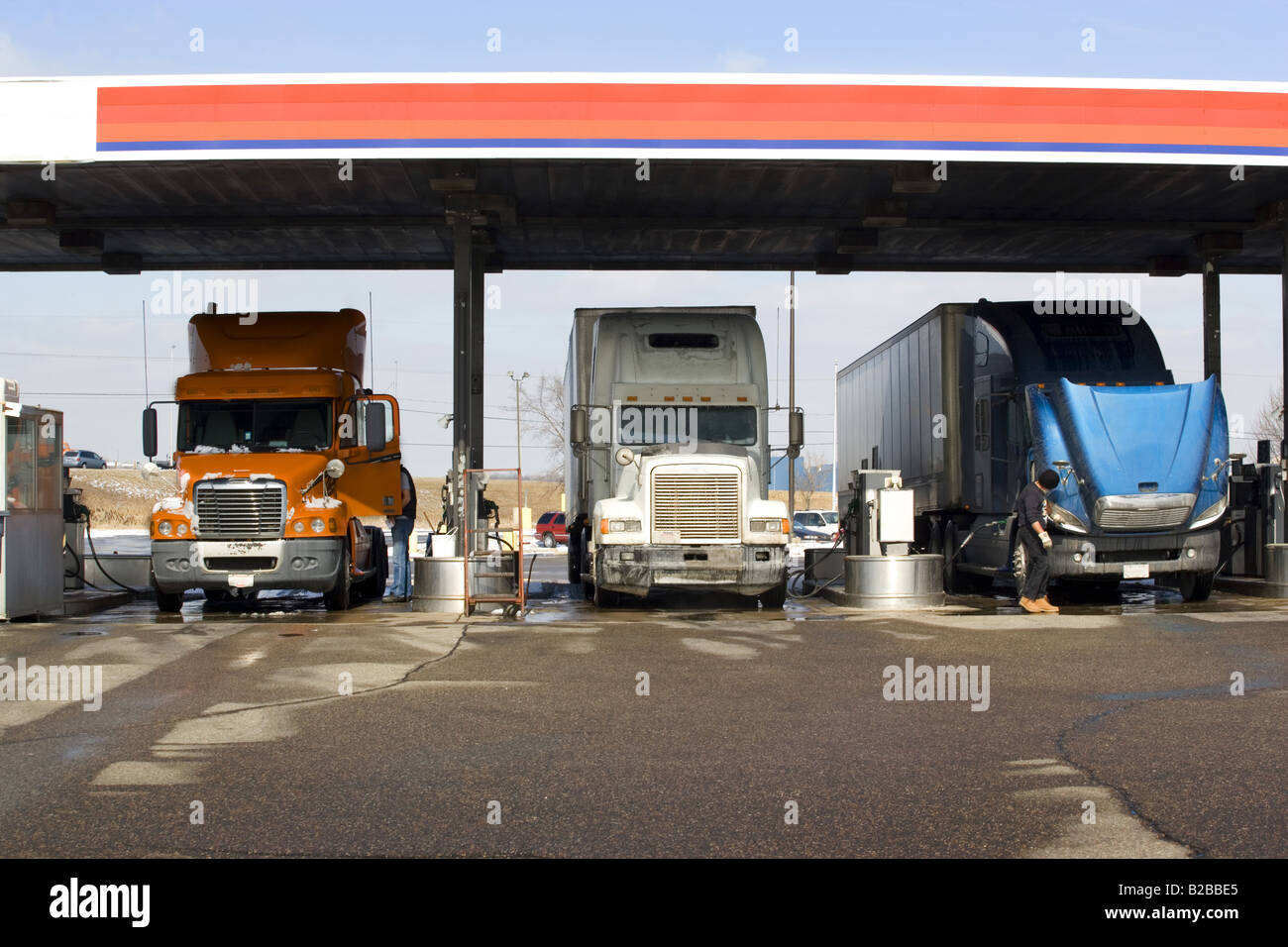 Three trucks filling up with gas at Citgo service station Stock Photo