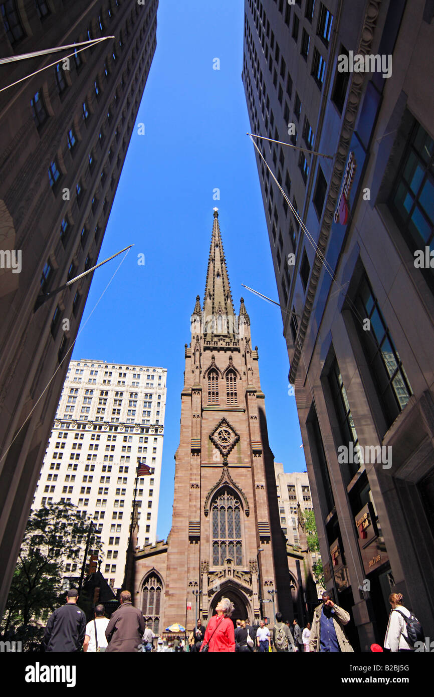 Trinity Church from Wall Street - New York City, USA Stock Photo