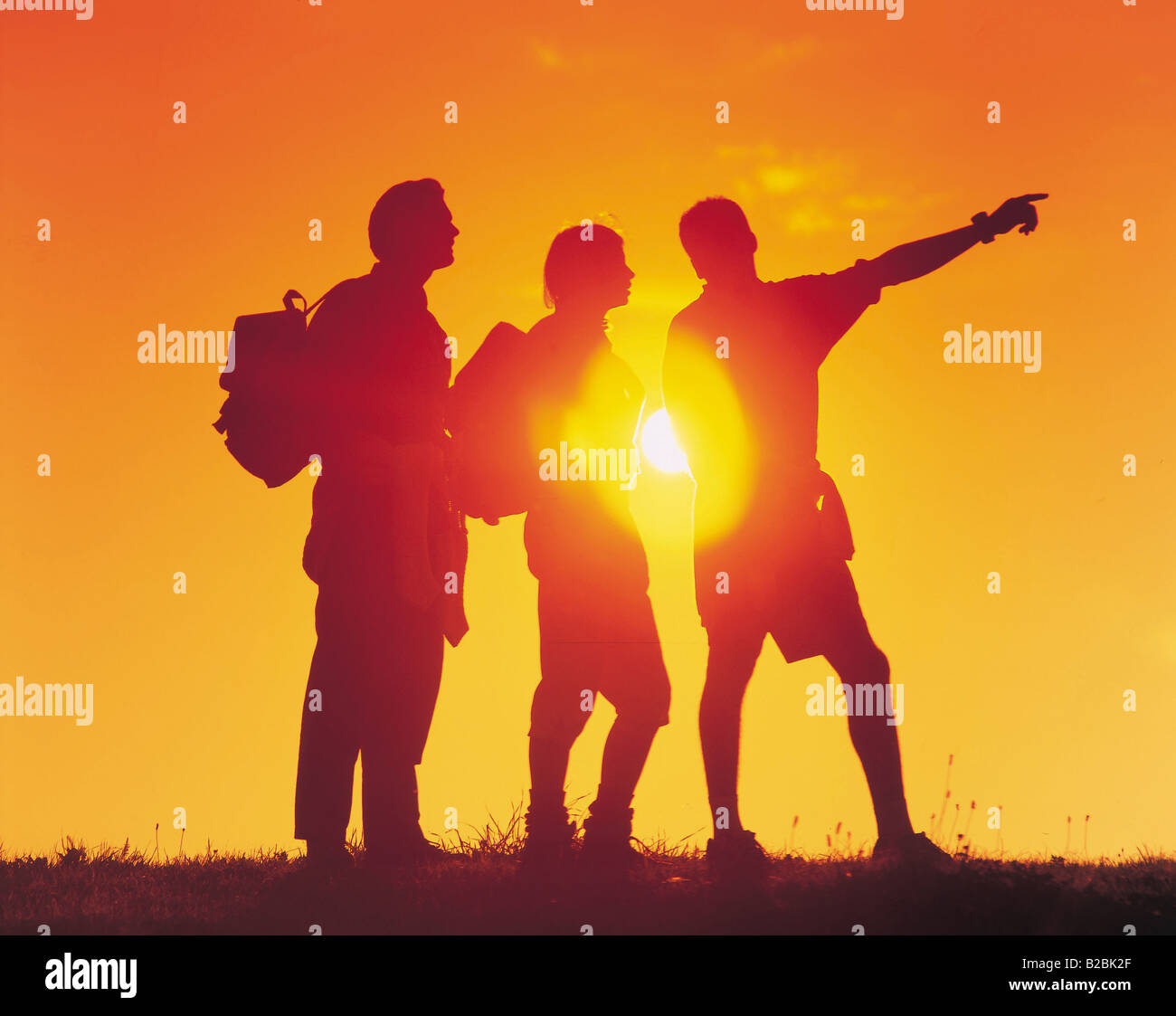 Walking into the sunset hi-res stock photography and images - Alamy