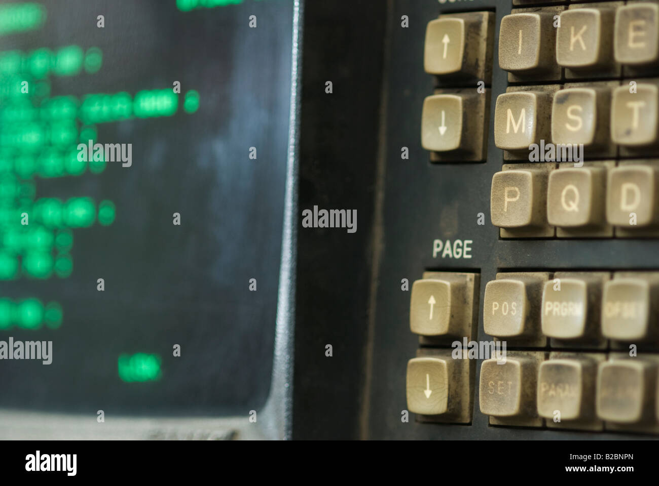 Keypad and monitor of old worn numerical control metalworking lathe Stock Photo
