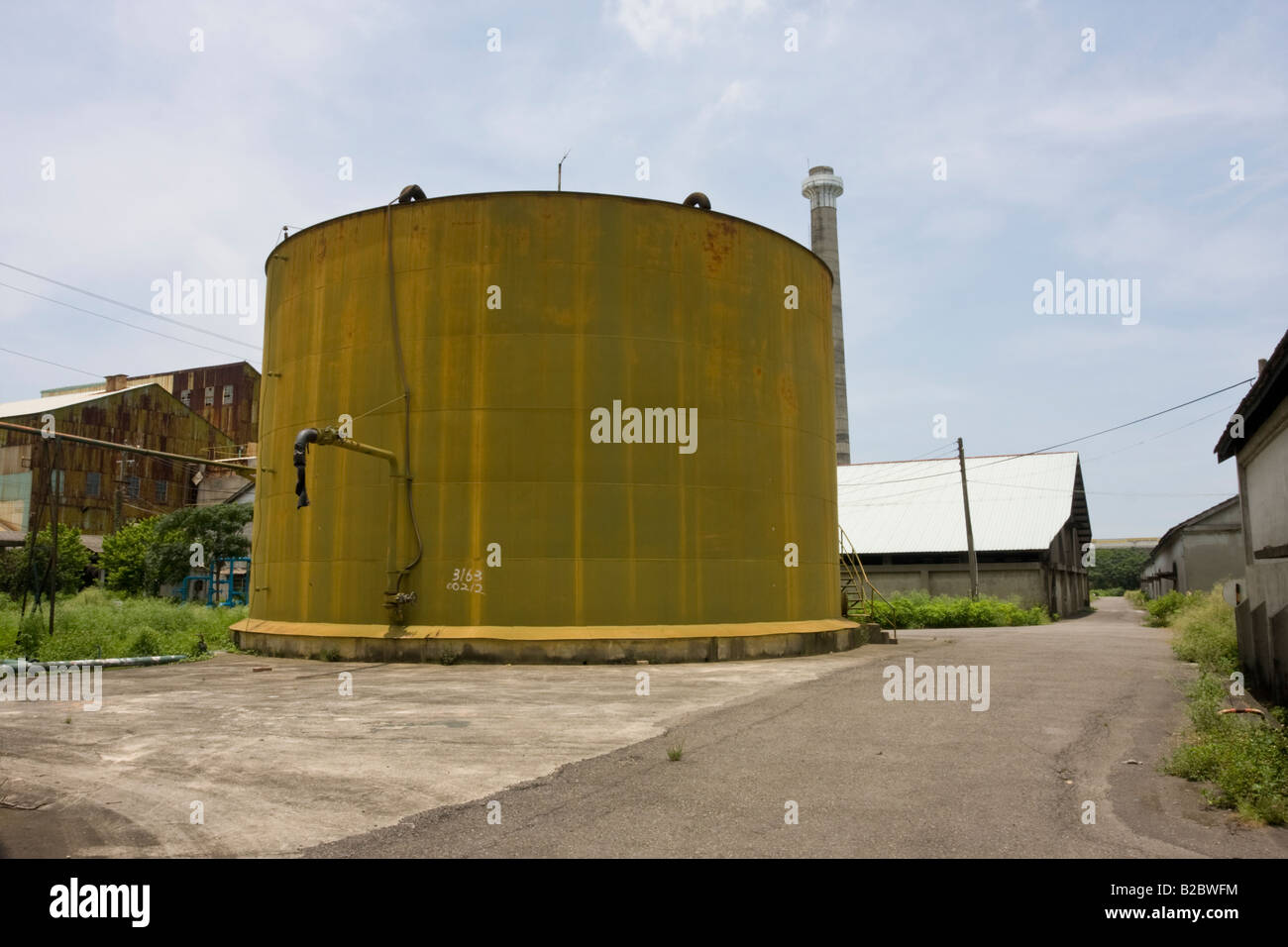 Old warehouses and chimney with public art Ciaotou Sugar Factory Ciaotou Kaohsiung Taiwan ROC Stock Photo