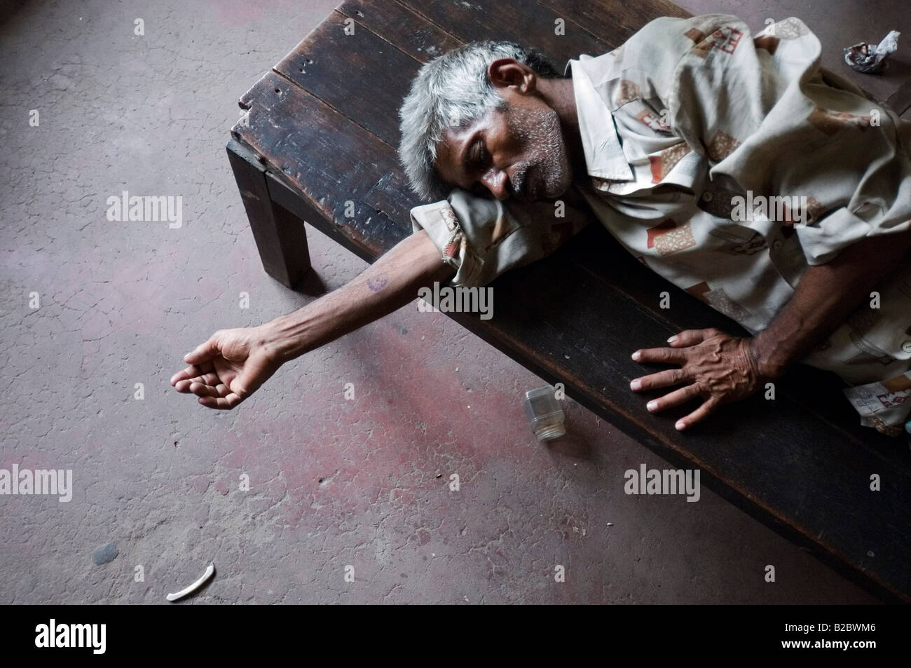 Patient asleep in the TB clinic jointly led by the aid organisations Howrah South Point and Aerzte fuer die Dritte Welt, Doctor Stock Photo
