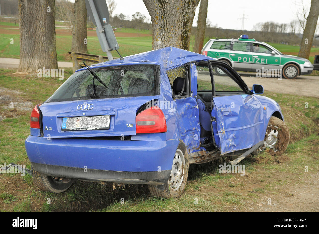 Fireman had an accident on the way to a fire at a hunting lodge, blue Audi  A3 car of the newly qualified 18 year old in front o Stock Photo - Alamy