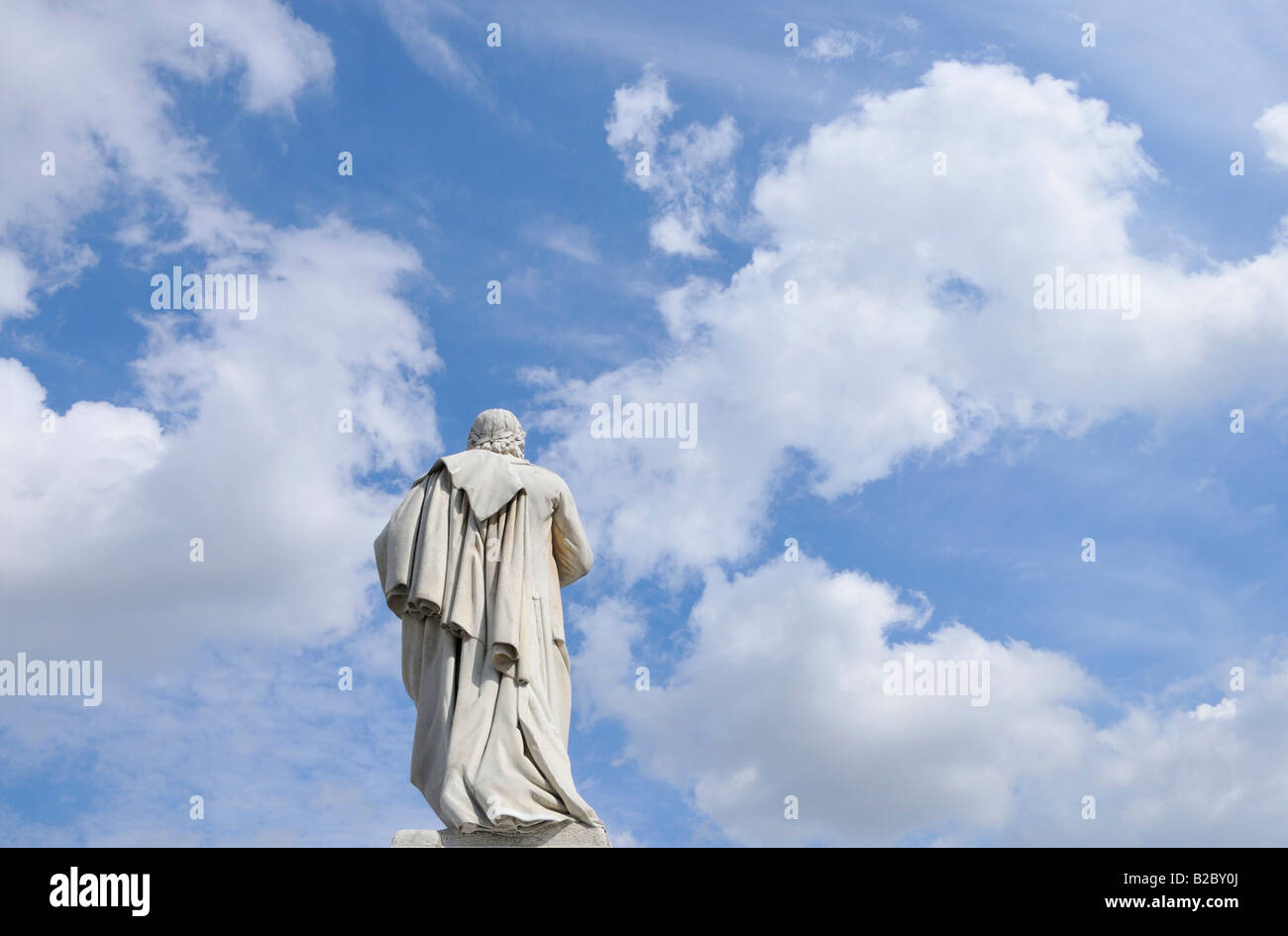 Rear view of the Schiller Monument on Gendarmenmarkt in front of a blue sky with white clouds, Berlin, Germany, Europe Stock Photo