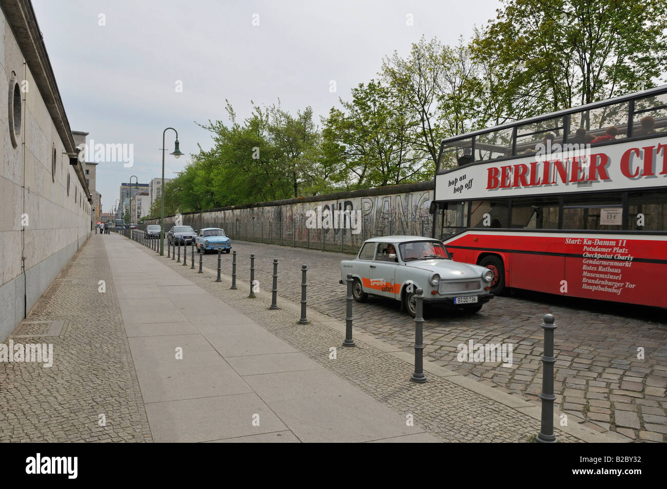 City tours by bus and Trabant along the former Berlin Wall, Niederkirchner Strasse, Berlin-Mitte, Central Berlin Stock Photo