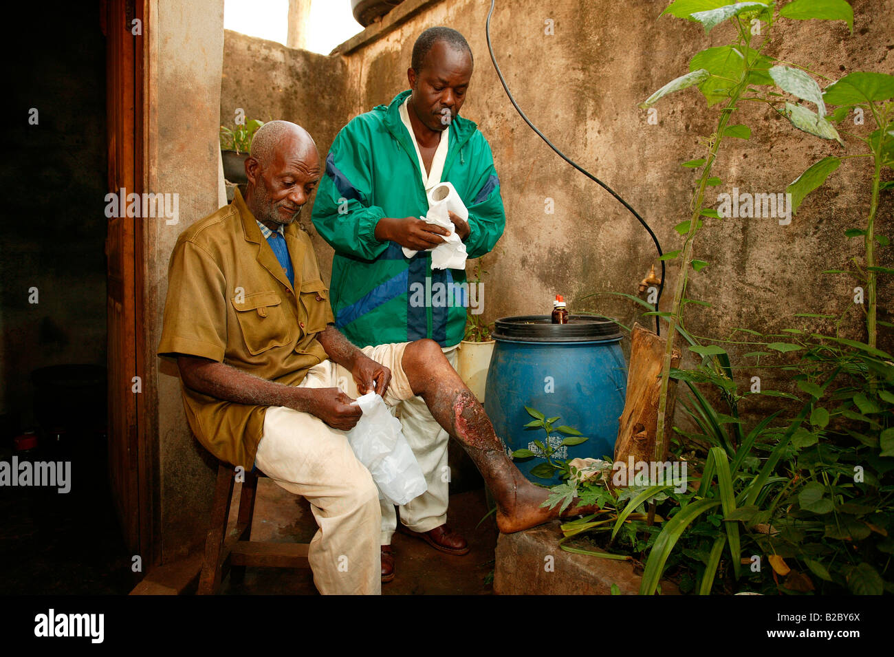 Natural healer treating a patient's bad leg, Yaounde, Cameroon, Africa Stock Photo