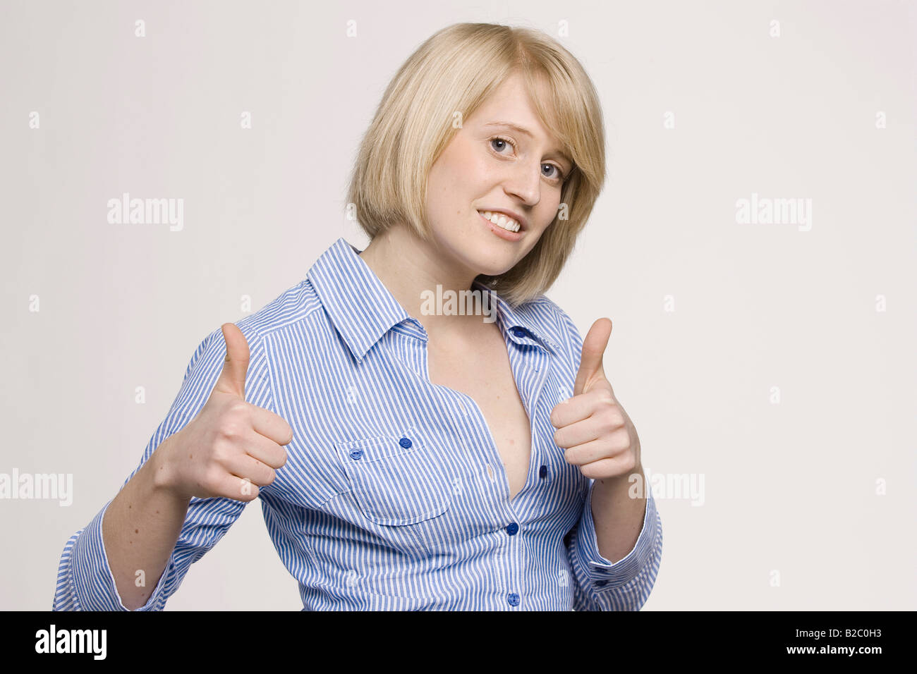 Thumbs up portrait woman hi-res stock photography and images - Alamy