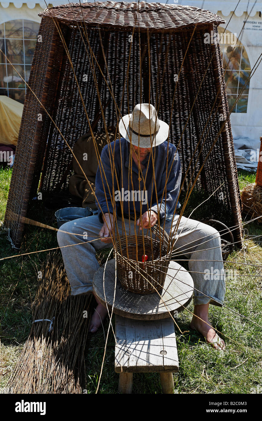 Basket weaver at work, traditional craft market, Flachsmarkt Burg Linn, Krefeld, Lower Rhineland, North Rhine Westphalia Stock Photo