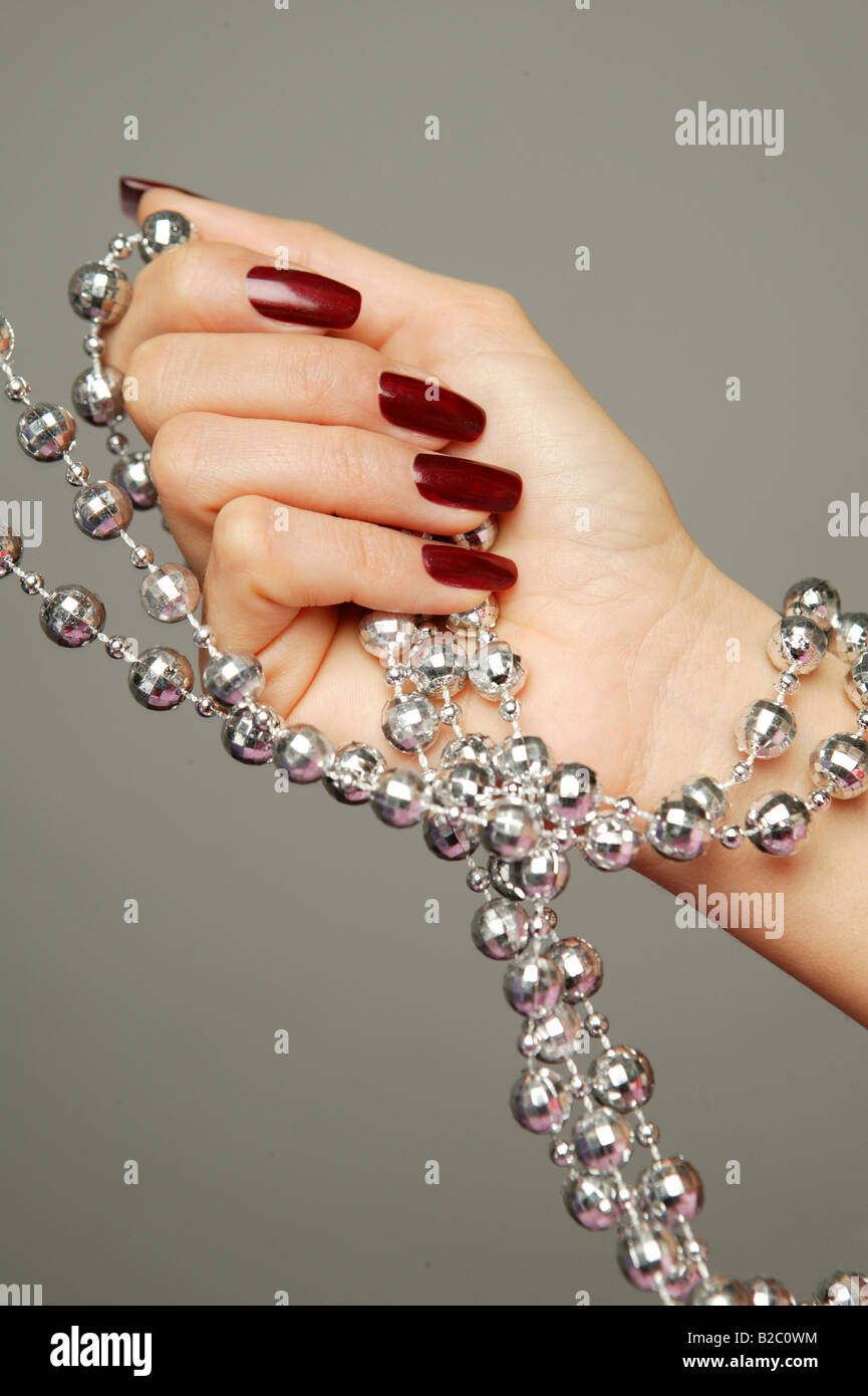 Hand, necklace Stock Photo