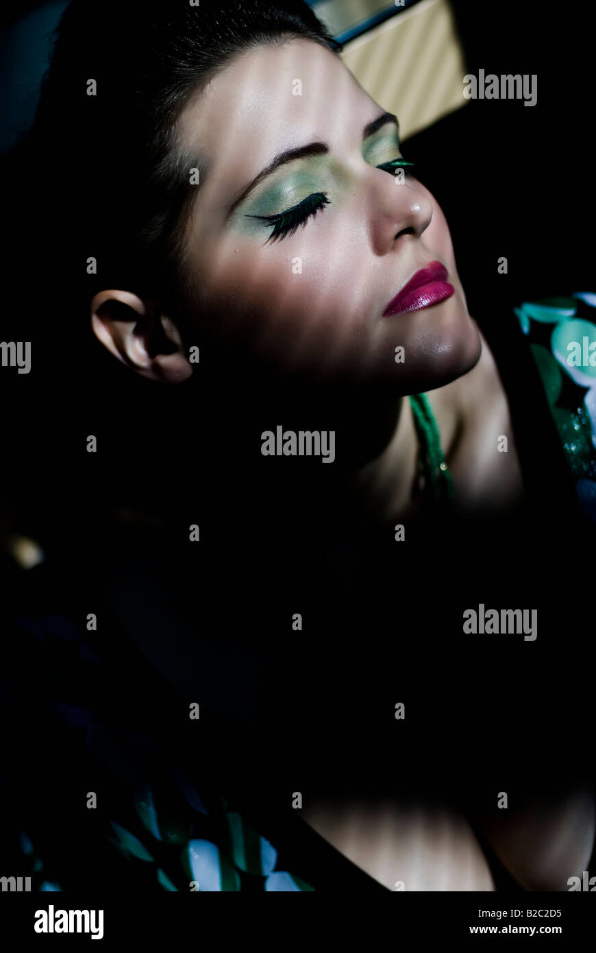 portrait of a young woman with closed eyes Stock Photo - Alamy