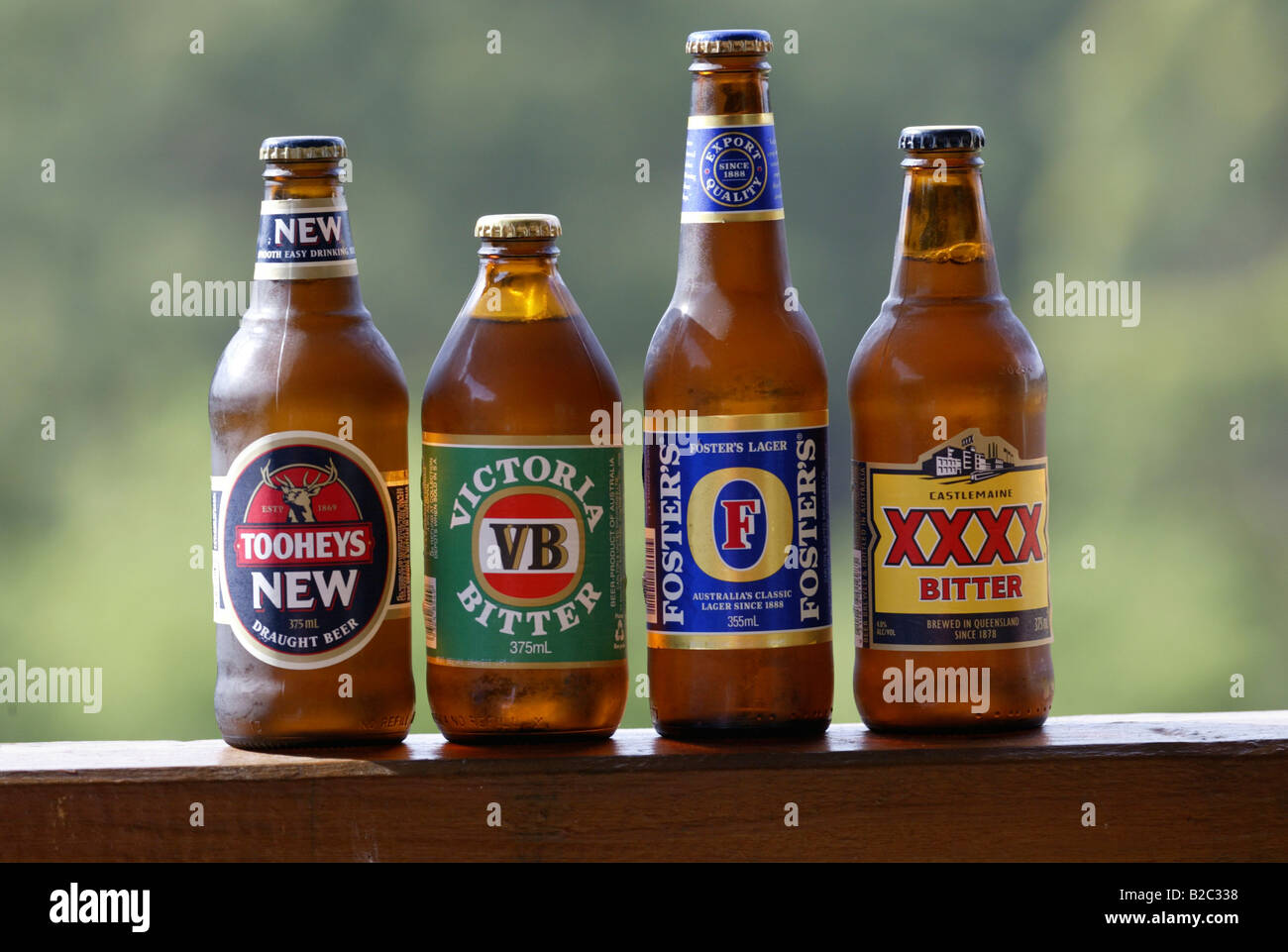 Beer bottles of Australian beers, Tooheys New, Victoria Bitter or VB, Foster's, and XXXX Stock Photo