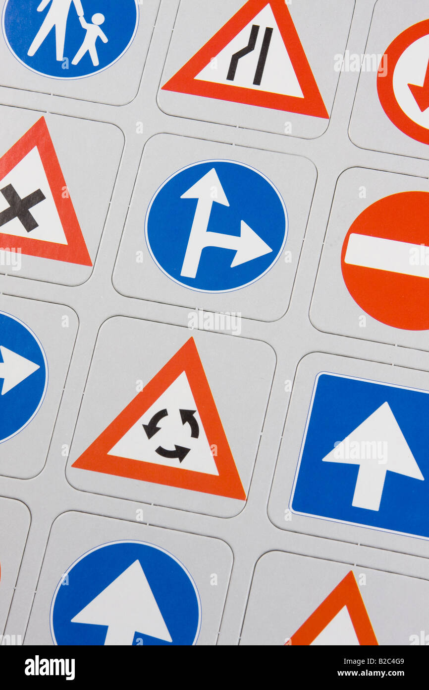 Various traffic signs printed on cardboard Stock Photo