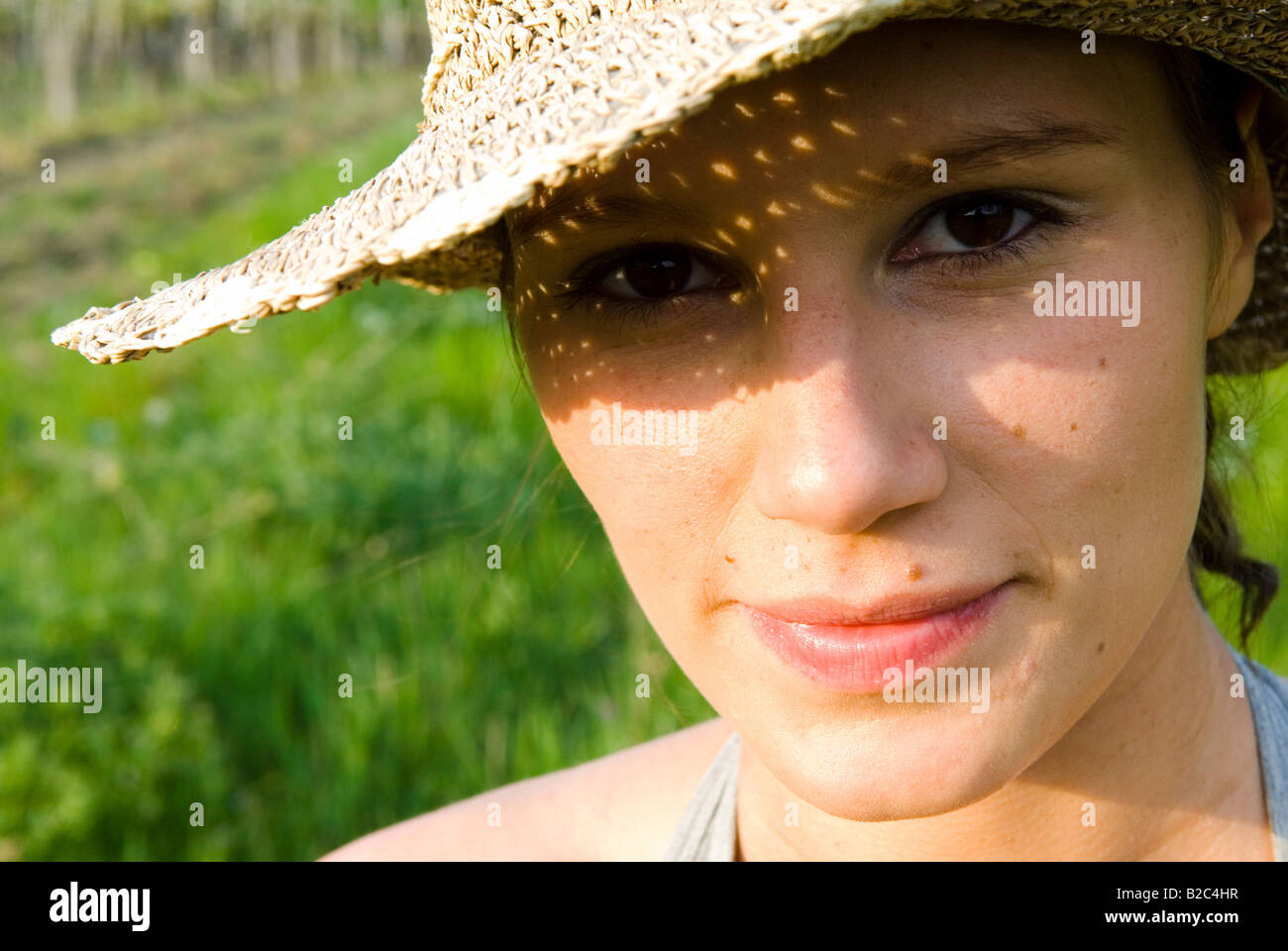 young woman with straw hat Stock Photo - Alamy