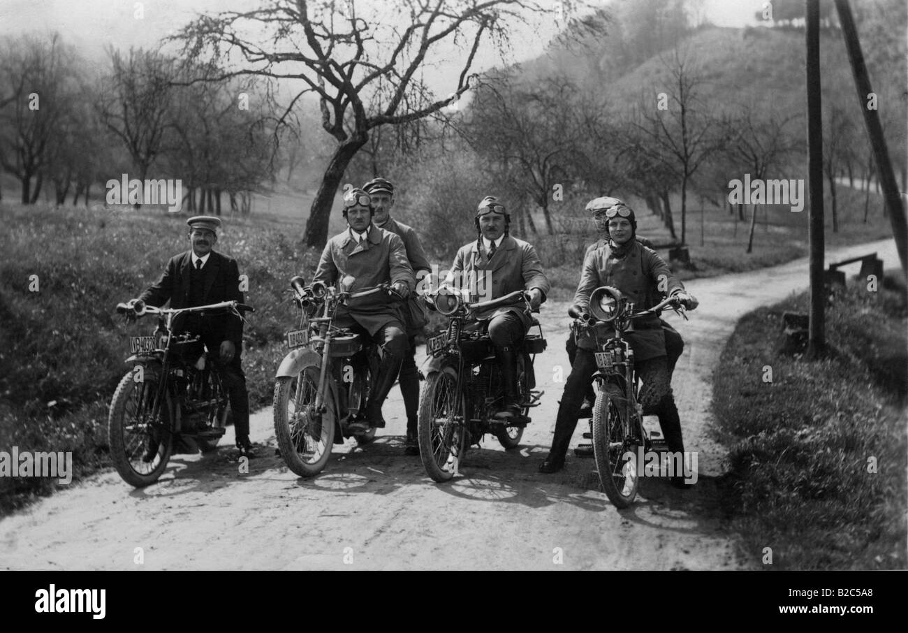 4 motorcyclists on the road, historic picture from about 1940 Stock Photo