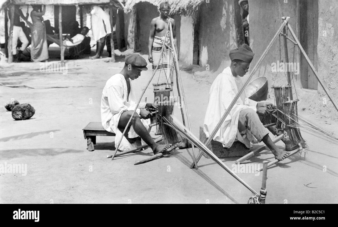 Two african craftsmen at work, historical photo, circa 1920 Stock Photo