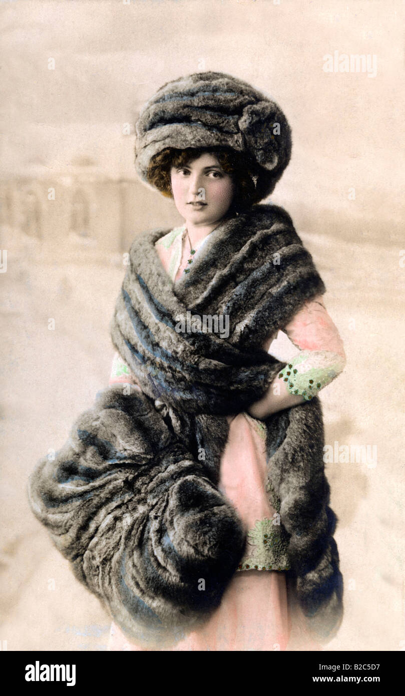 Woman wrapped in fur, historical photo, circa 1910 Stock Photo