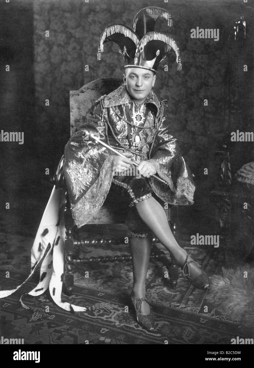 Man dressed up as king, historic picture from about 1920 Stock Photo