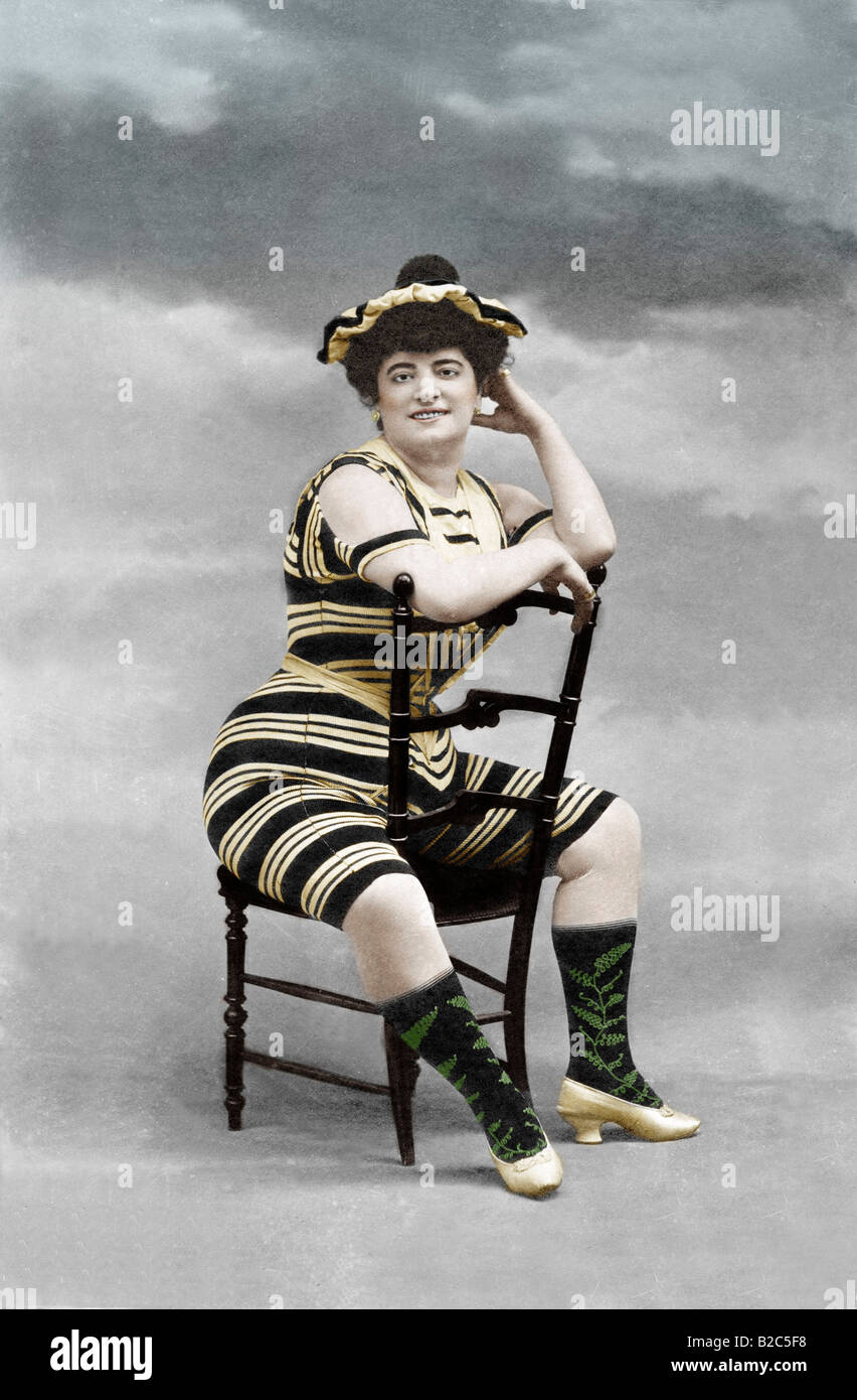 Woman in a corsett sitting on a chair, historical photo, circa 1910 Stock Photo