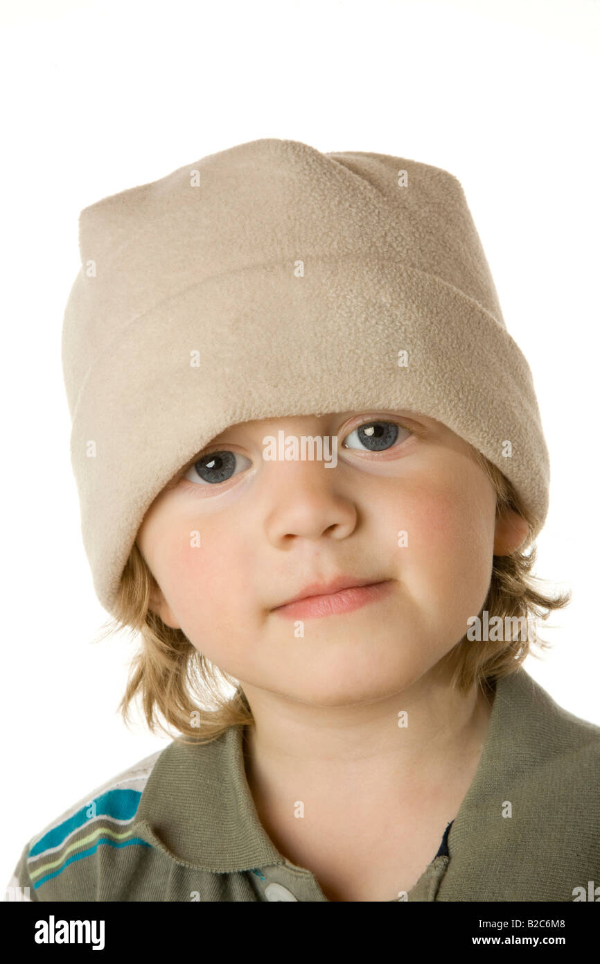 Boy wearing woolly hat indoors hires stock photography and images Alamy