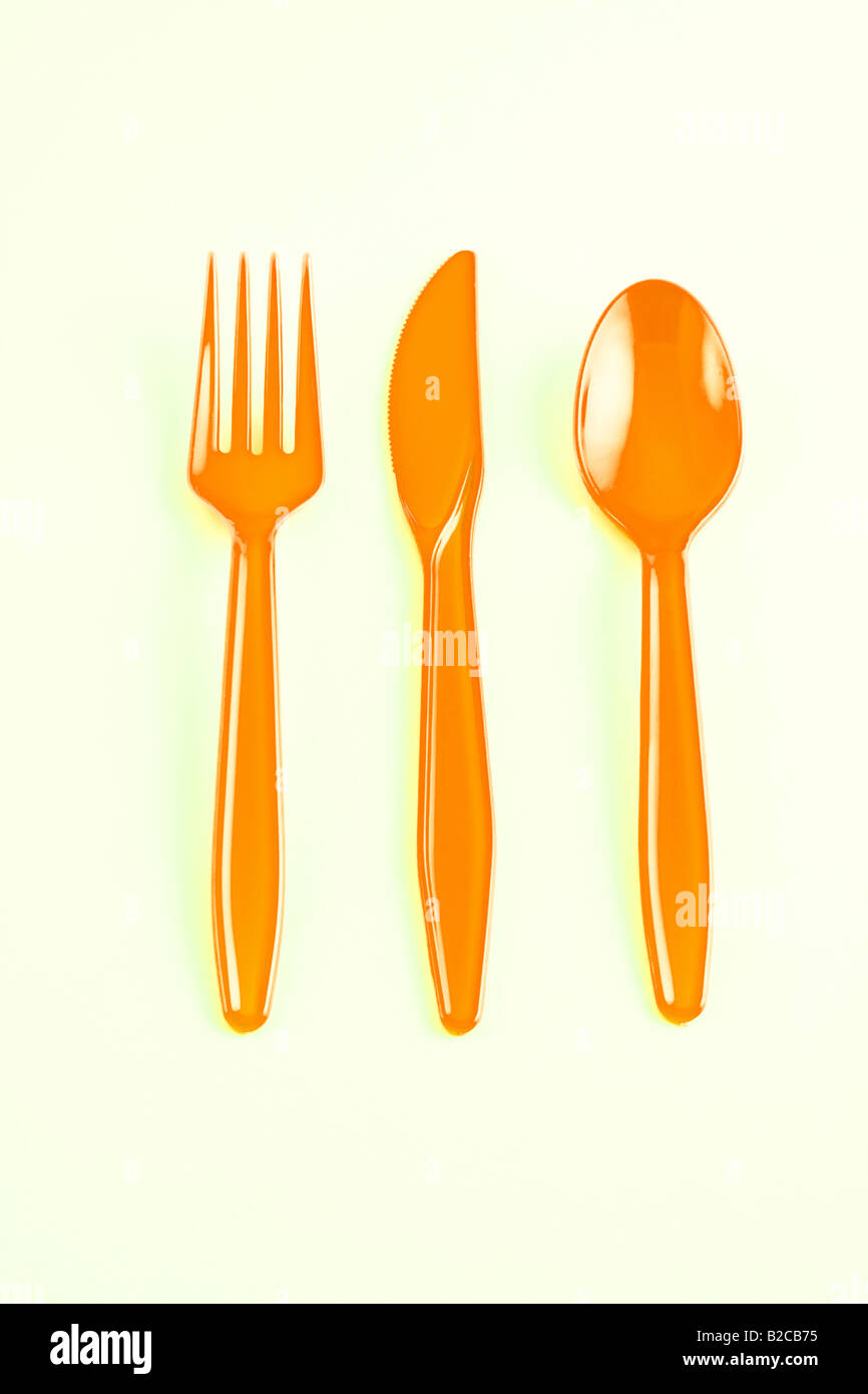 Orange Plastic Utensils Stock Photo Alamy