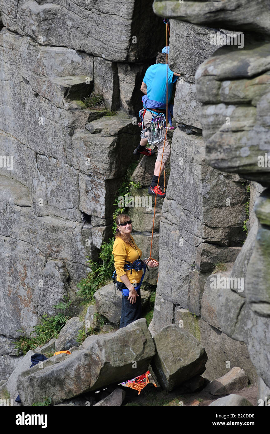 Rock climber on Stanage Edge in the Peak District Stock Photo Alamy