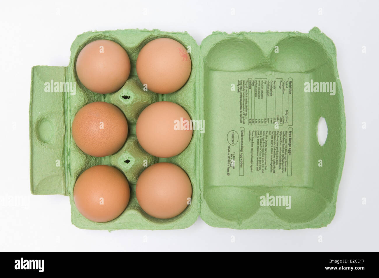 Half dozen eggs in carton Stock Photo