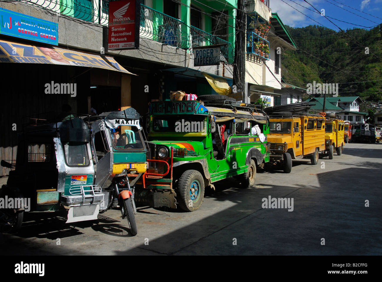 Parking jeepneys and tricycle in Bontoc, North Luzon, Philippines, Southeast Asia Stock Photo