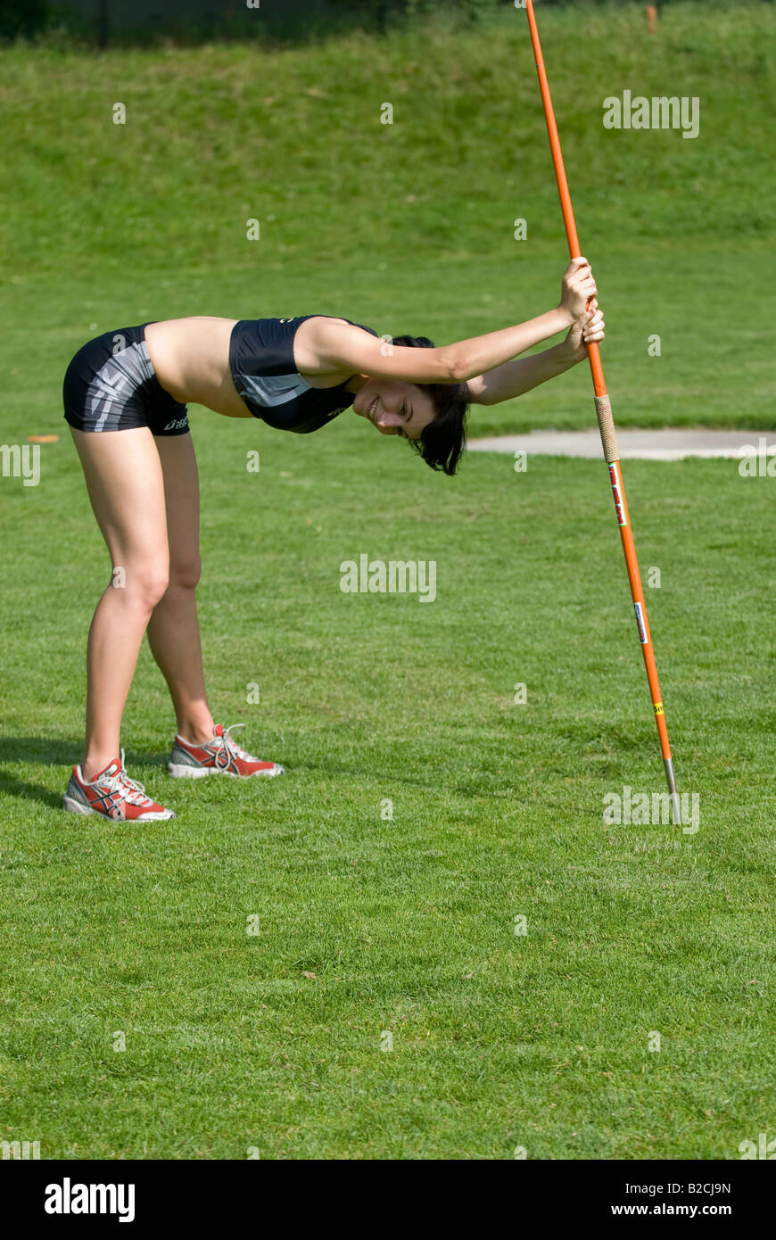 young female athlete with javelin Stock Photo Alamy