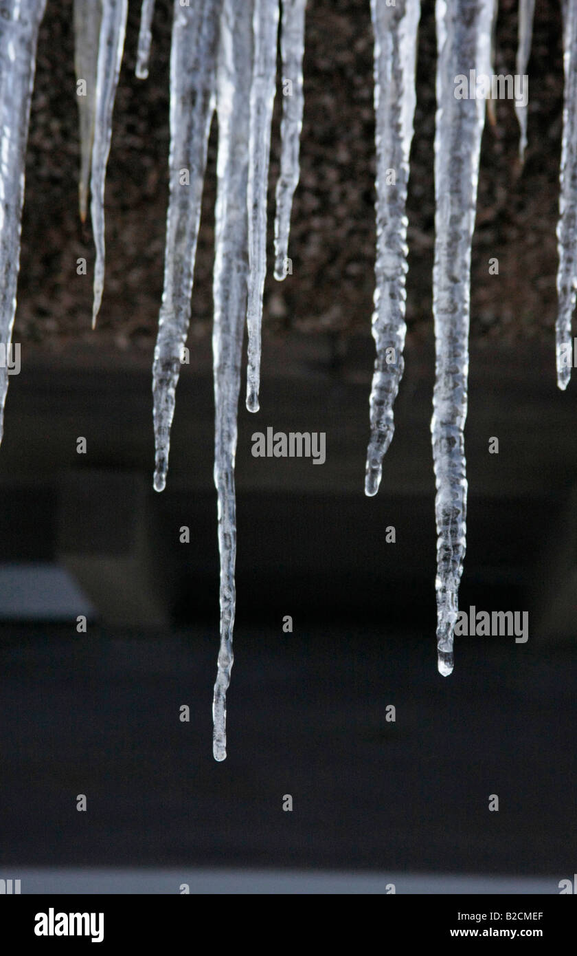 Icicles on a Roof Stock Photo