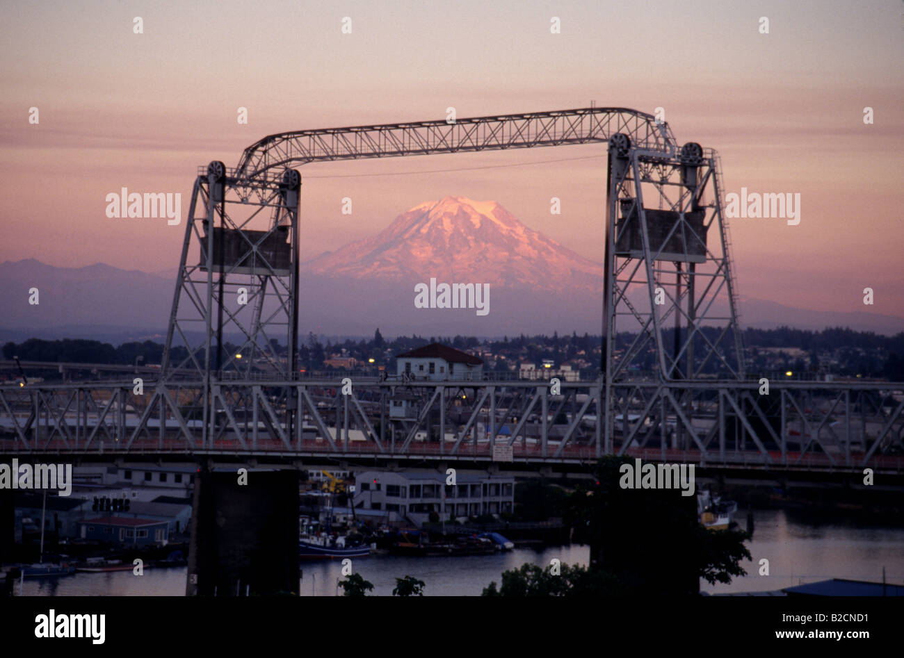 Mt Rainier part of the Cascade Mountain Range and 11th Street Bridge to Tidal Flats and The Port of Tacoma Washington Stock Photo