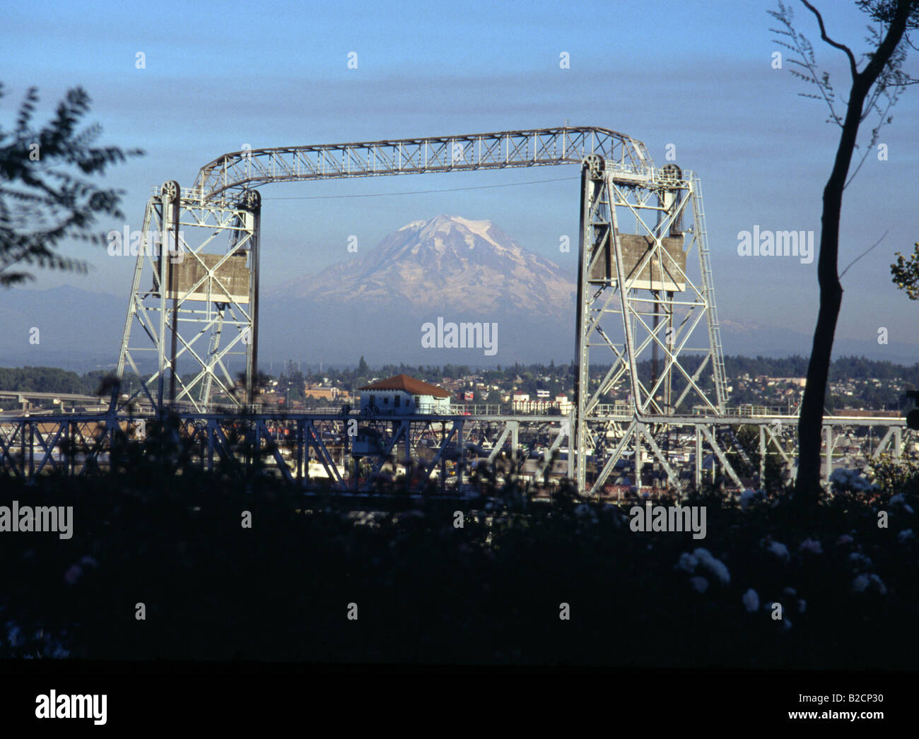 Mt Rainier part of the Cascade Mountain Range and 11th Street Bridge to Tidal Flats and The Port of Tacoma Washington Stock Photo