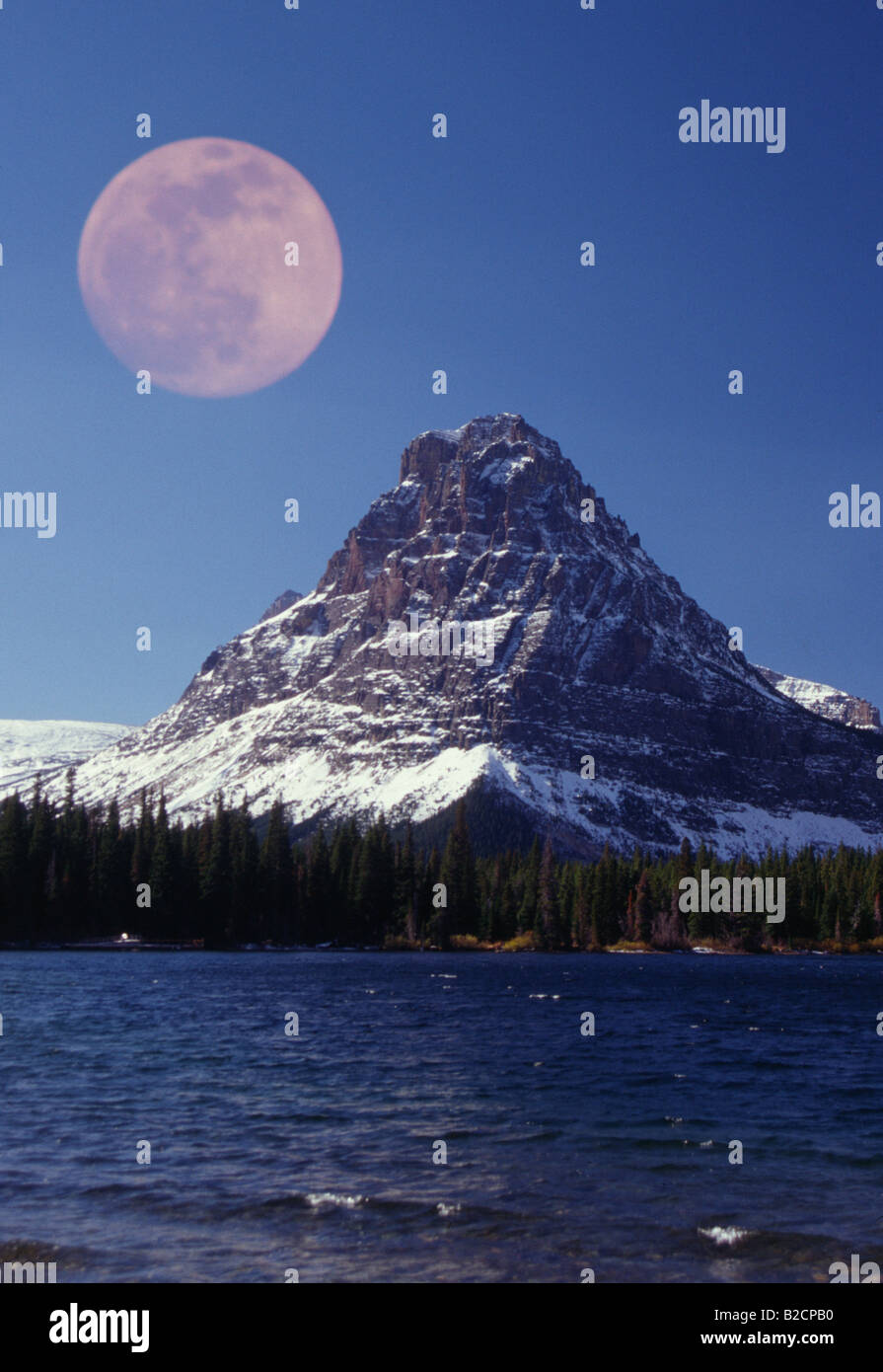Two Medicine Montana Glacier National Park with Full Moon Rising Stock