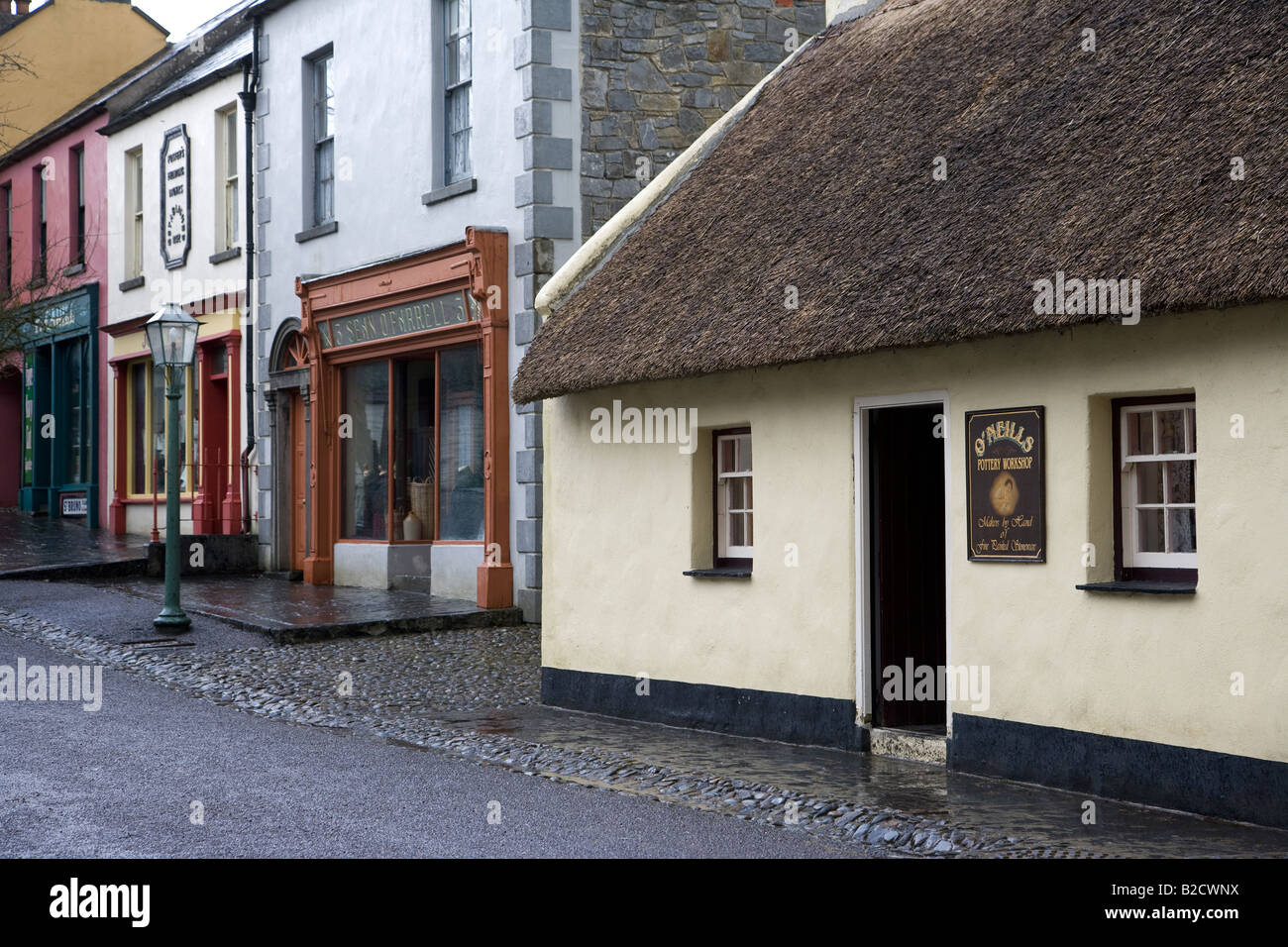 Old fashioned Irish street from 19th century at Bunratty folk park, County Clare, Ireland Stock Photo