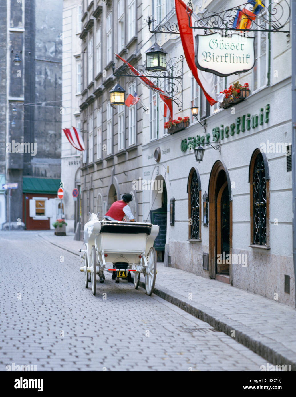 Street scene with Fiaker in the Old Town Austria, Stock Photo