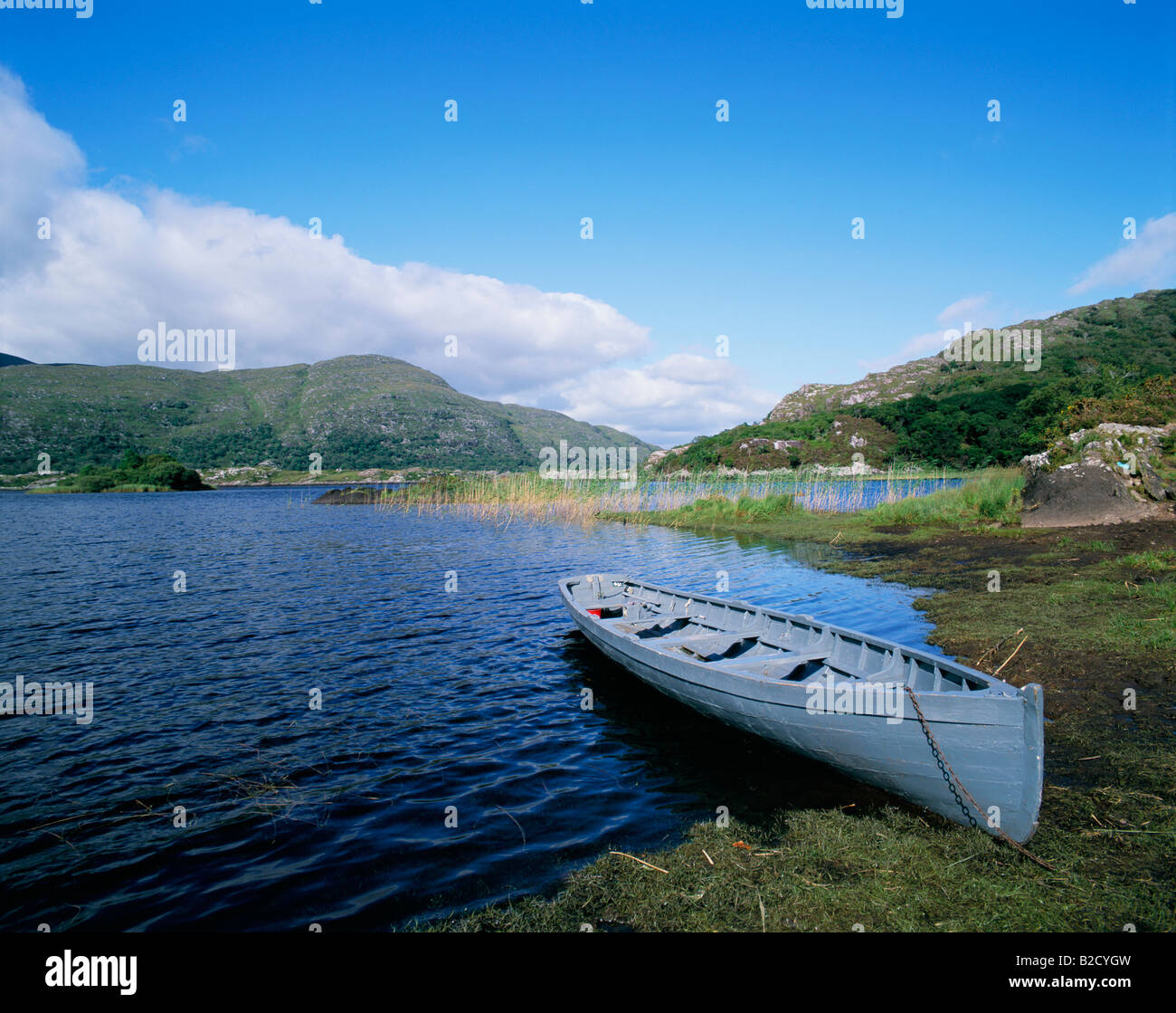 Lakes with rowing boat Ireland, County Kerry Stock Photo Alamy