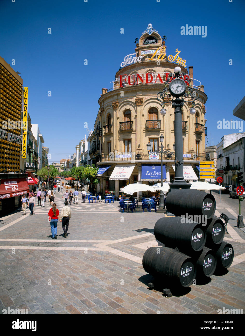 Street Scene with Cafes and Sherry Barrels Spain, Andalucia Stock Photo