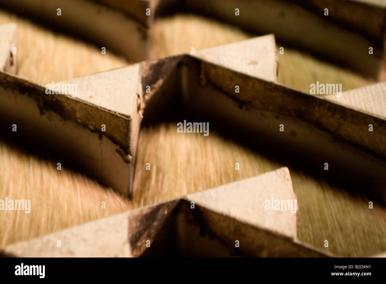 A machine shakes and sorts rice in a mill in the Mekong Delta Vietnam ...