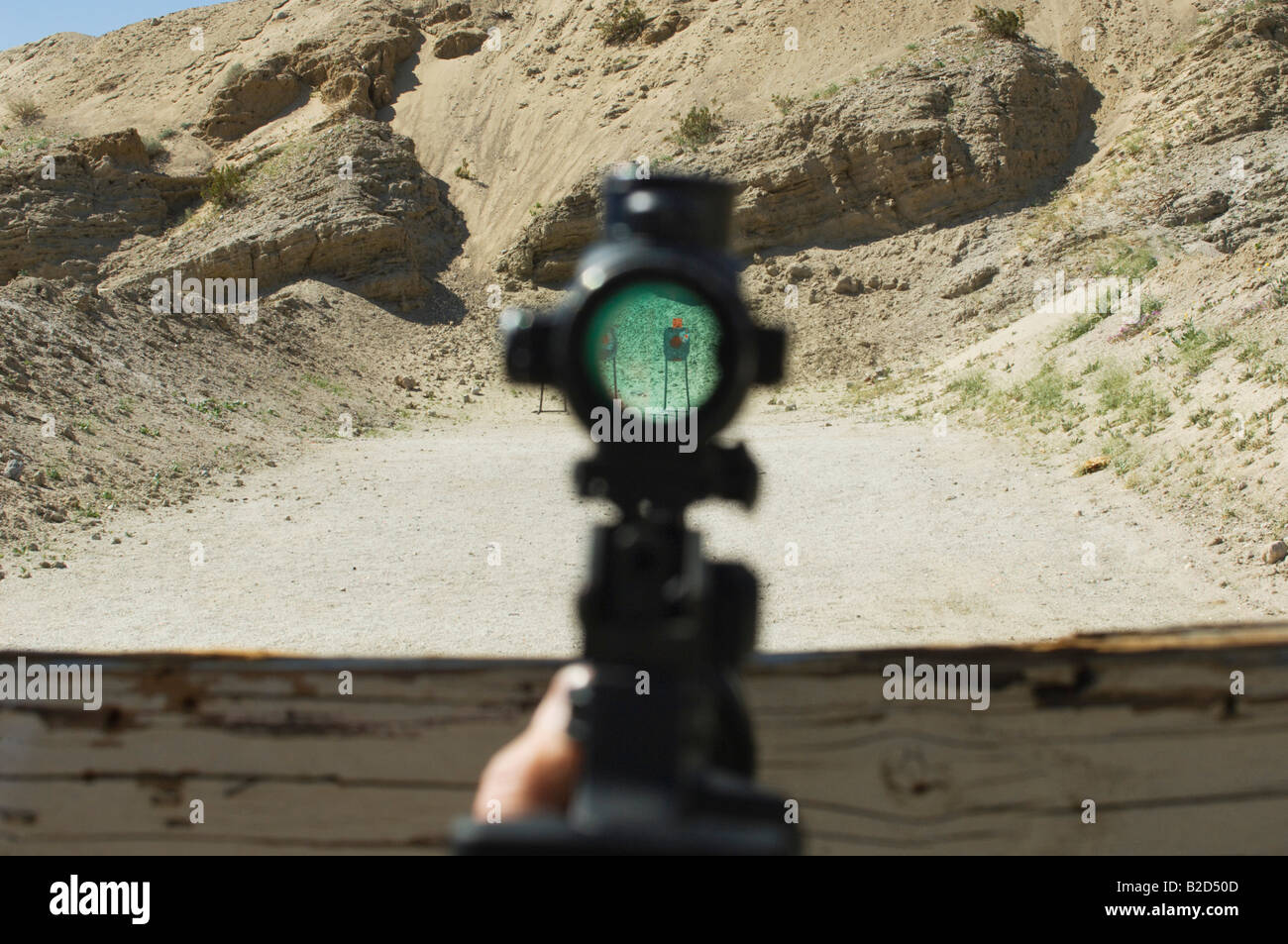 Rifle sight aiming at target on firing range Stock Photo Alamy