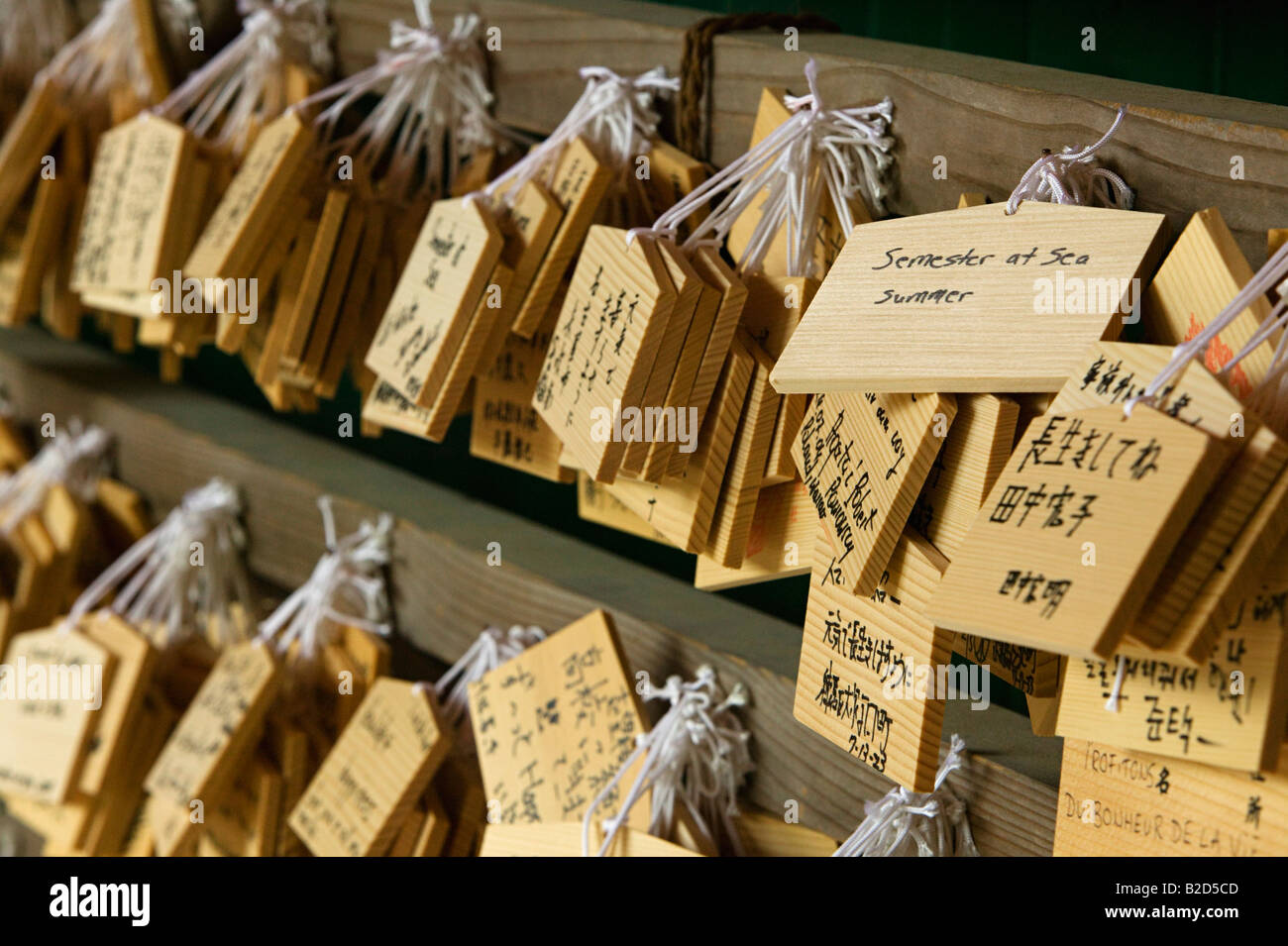 Japan, Nara, Kasuga Shrine, Small wooden plaques with prayers and wishes (Ema) Stock Photo