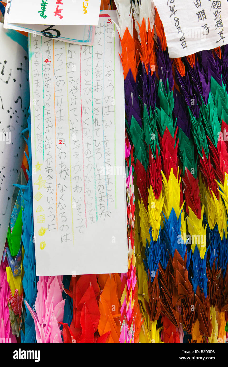 Japan, Hiroshima, Peace Memorial Park, paper cranes and child's drawings, close-up Stock Photo