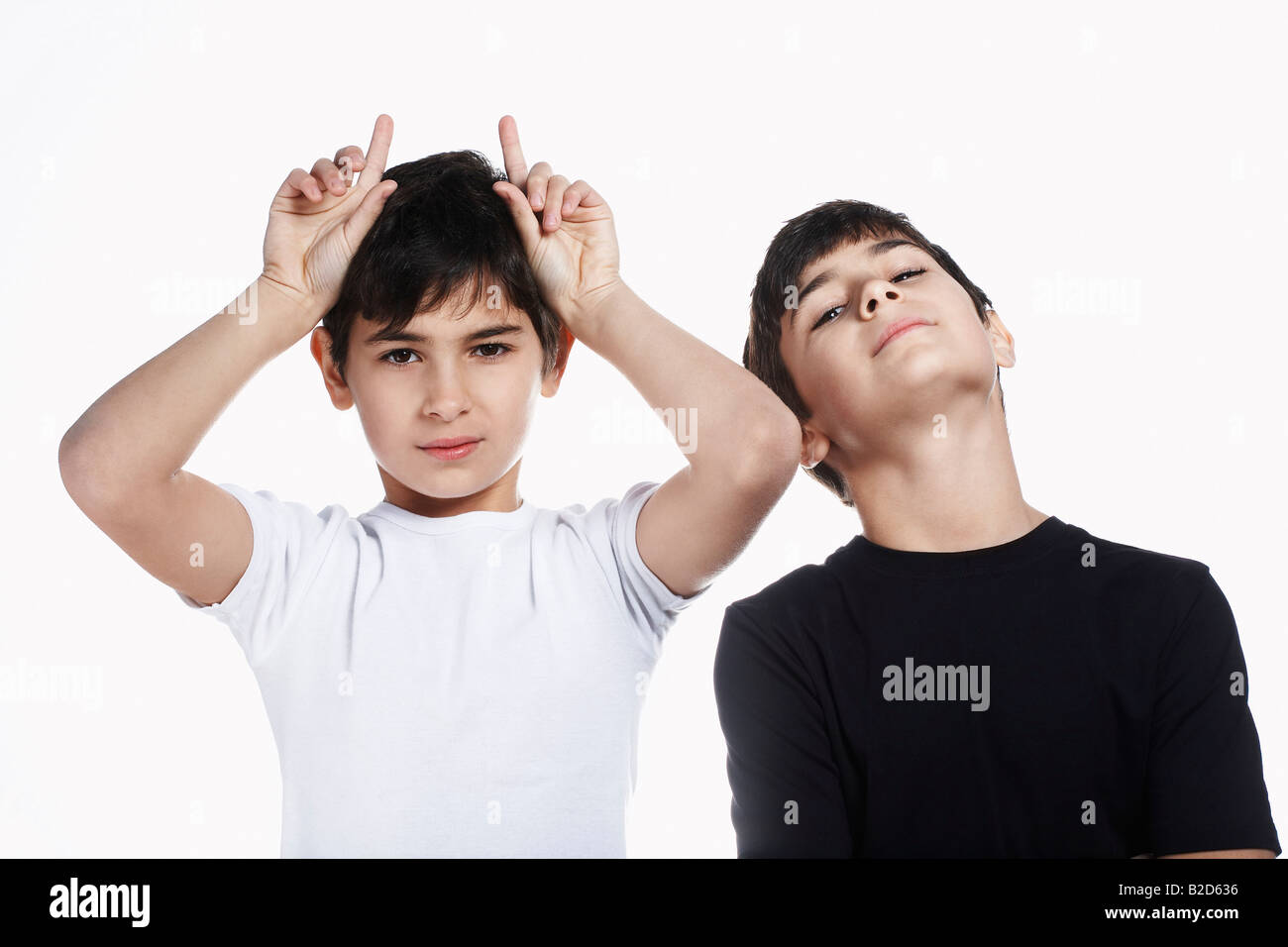 Identical twin brothers hi-res stock photography and images - Alamy