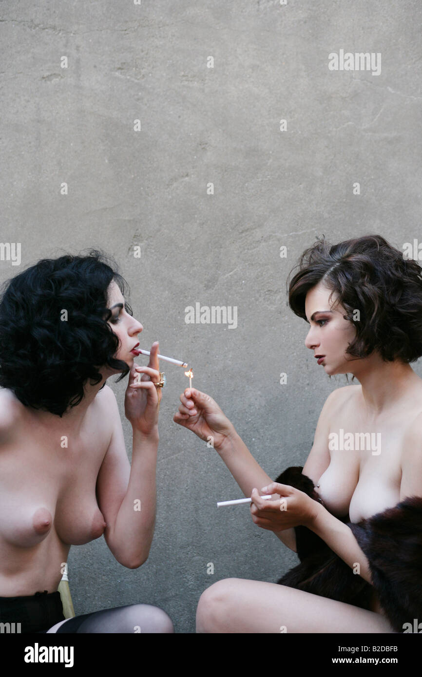 Naked women smoking