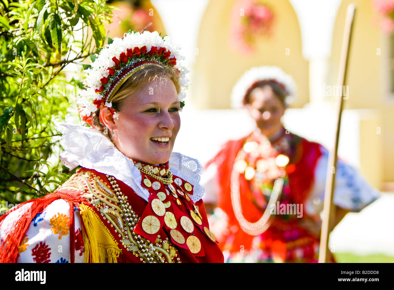 Girls in the Croatian traditional dress with ducats on the dress and headdress Stock Photo