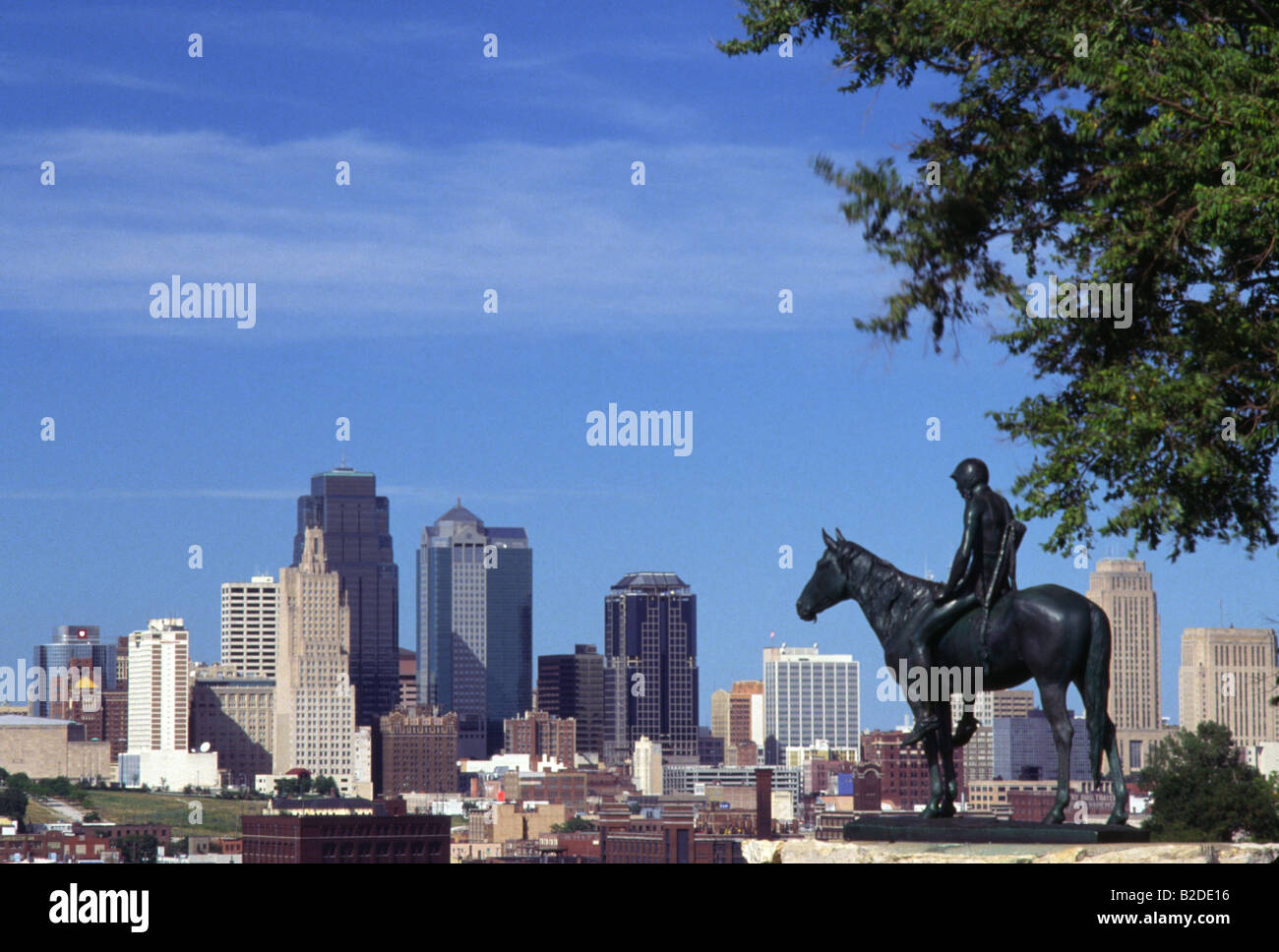 Kansas City Skyline with lone figure on horseback sculpture Stock Photo