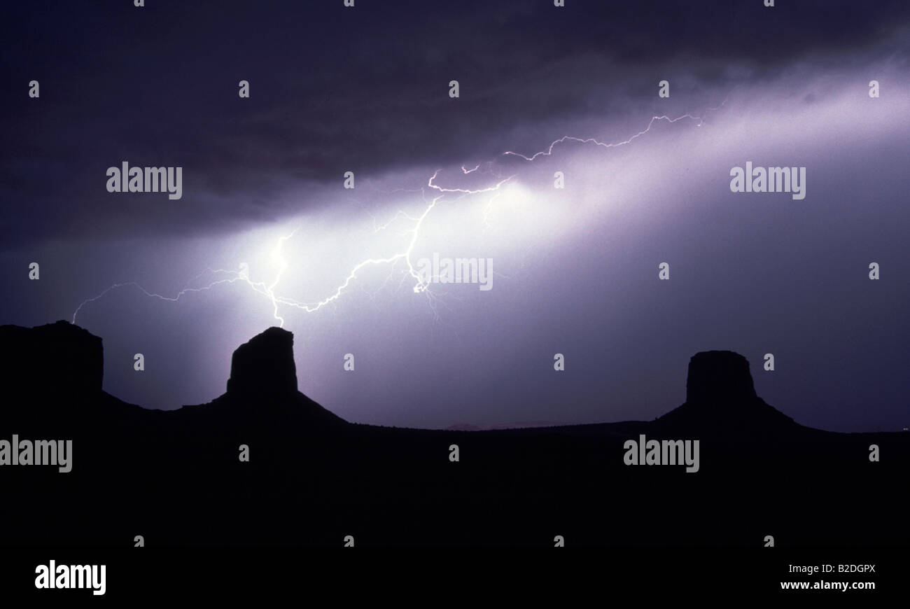 Lightning Strike in Monument Valley Utah Four Corners Buttes Navajo Nation Thunderstorm Electrical Storms Stock Photo