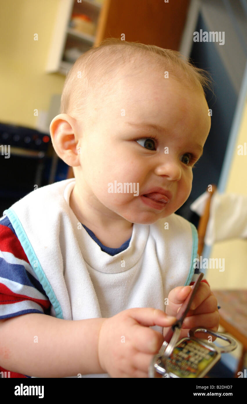 Baby with a set of car keys in Newport South Wales GB UK 2008 Stock ...