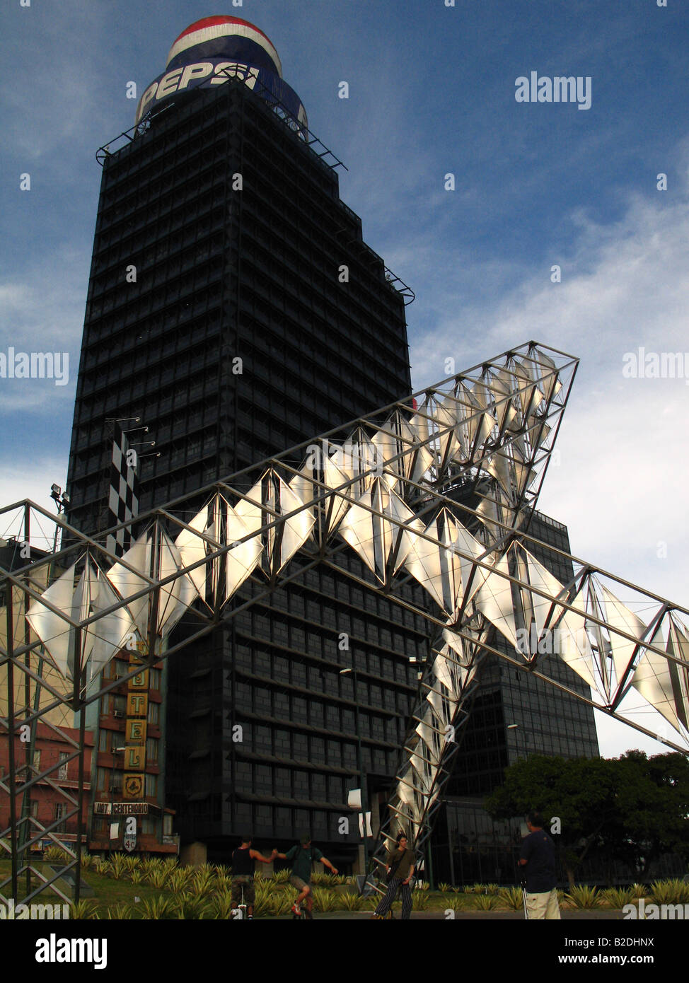Buildings and Abra Solar sculpture by Alejandro Otero, Plaza Venezuela, Caracas. Stock Photo