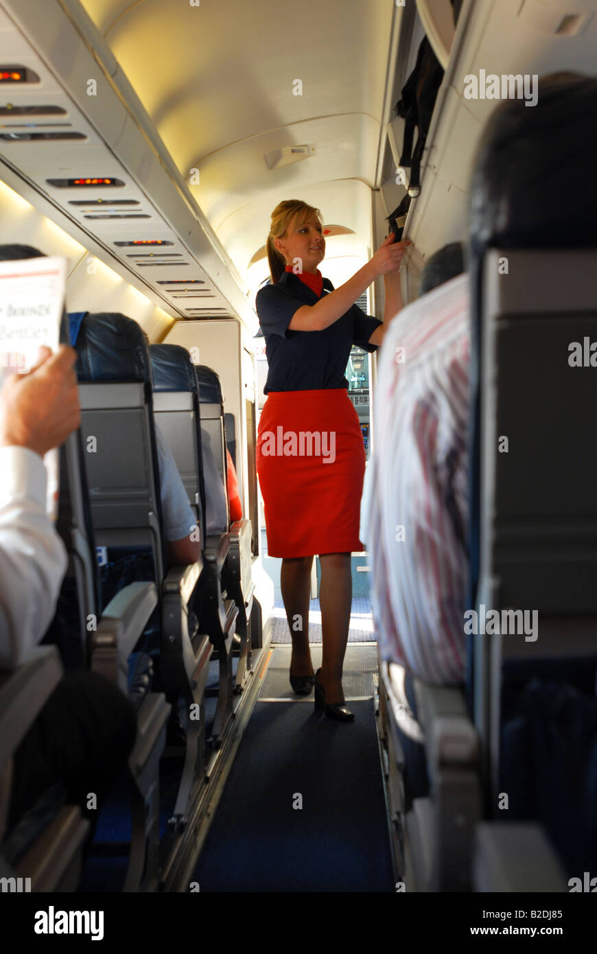 airline cabin crew prepares for take off Stock Photo
