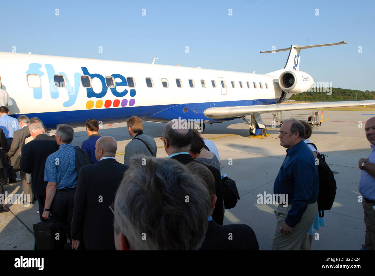 passengers on the steps of a plane Stock Photo Alamy