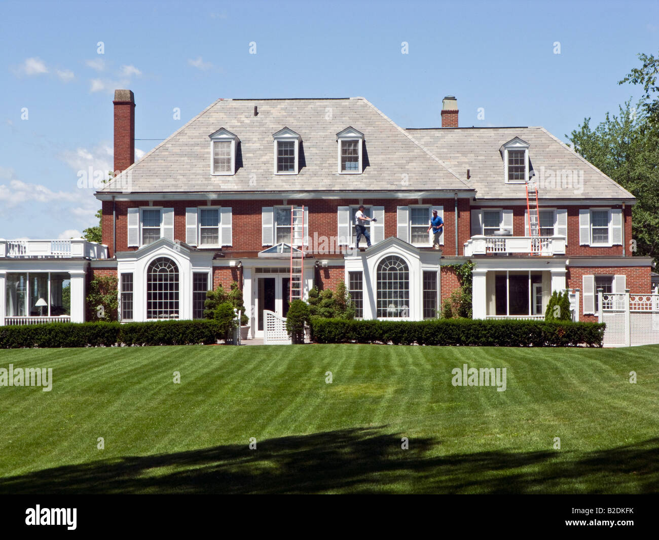 workmen at Gifford House, the president's residence, Tufts University